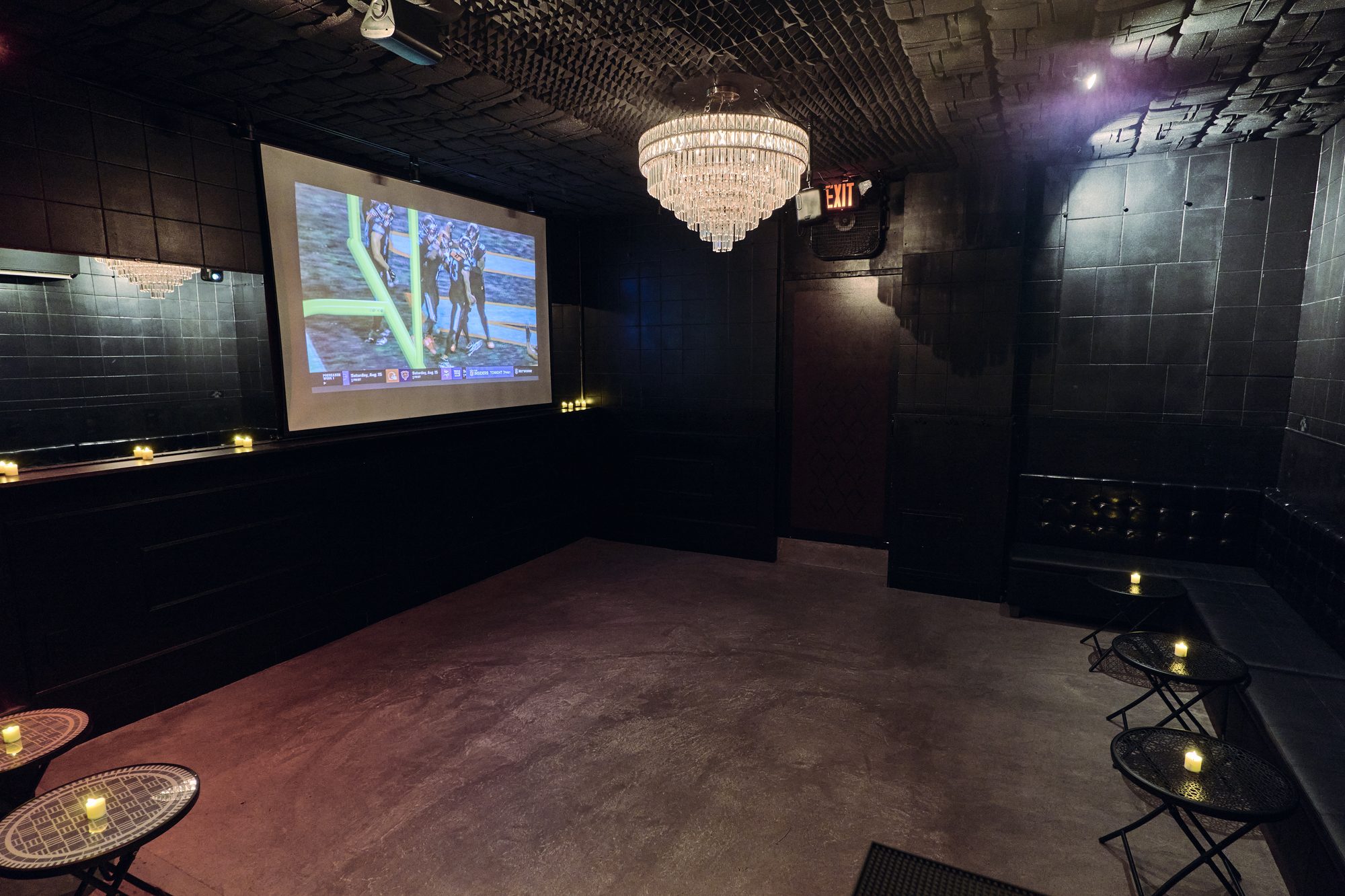The Back Room with the projector on, set up for a watch party