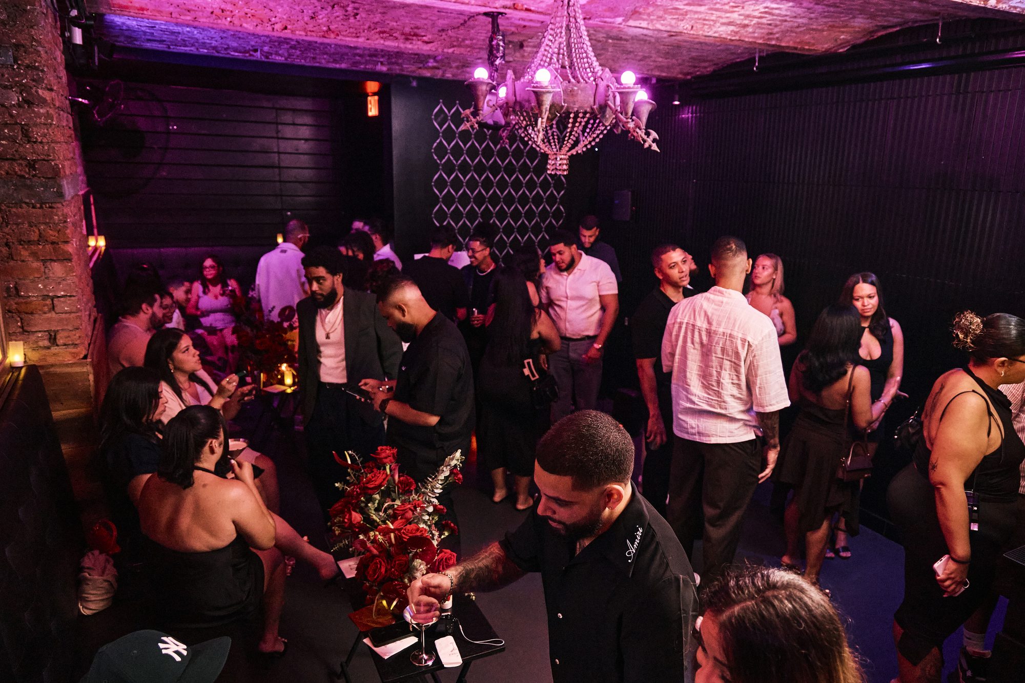 A celebration in the Whiskey Cellar with flowers on the tables
