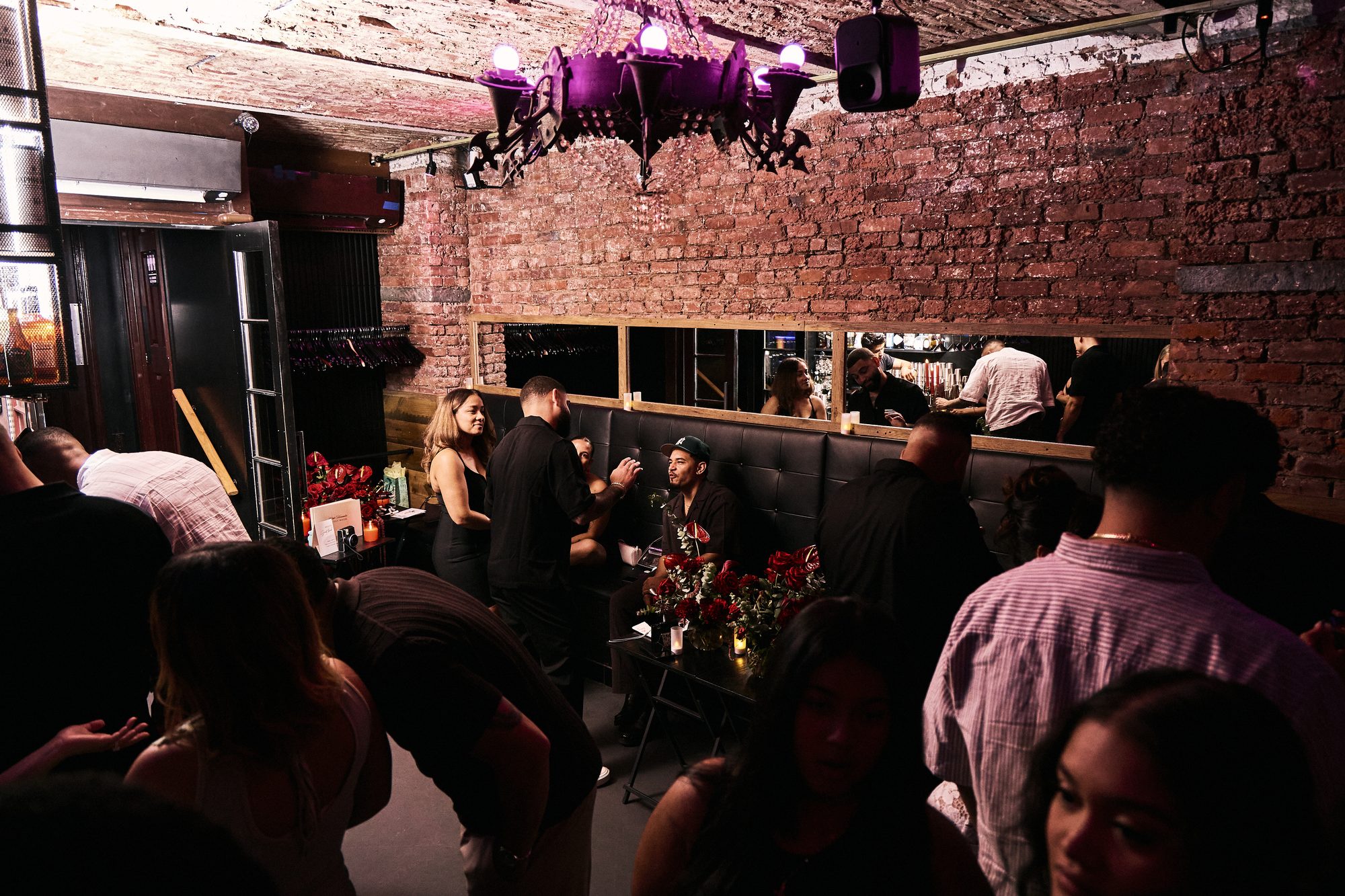Guests on the banquettes in the Whiskey Cellar
