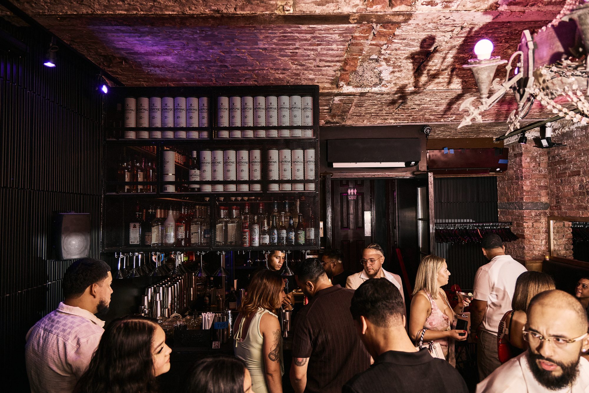 Guests at the Whiskey Cellar's private bar